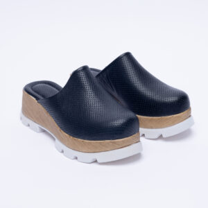 Zuecos cerrados negros de piel con plataforma efecto madera Sandalias mujer y chanclas Monocromáticos