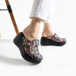 Zuecos estampados de piel con plataforma alta