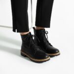 Botas planas de piel negros para mujer