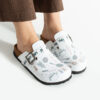 Zuecos planos estampados con hebilla Zuecos con dibujos Estampados