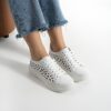 Zapatillas blancas de mujer en piel natural